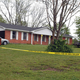 Police barricades hide the grisly scene inside the home of former MTV celebrity Bill Bellamy.